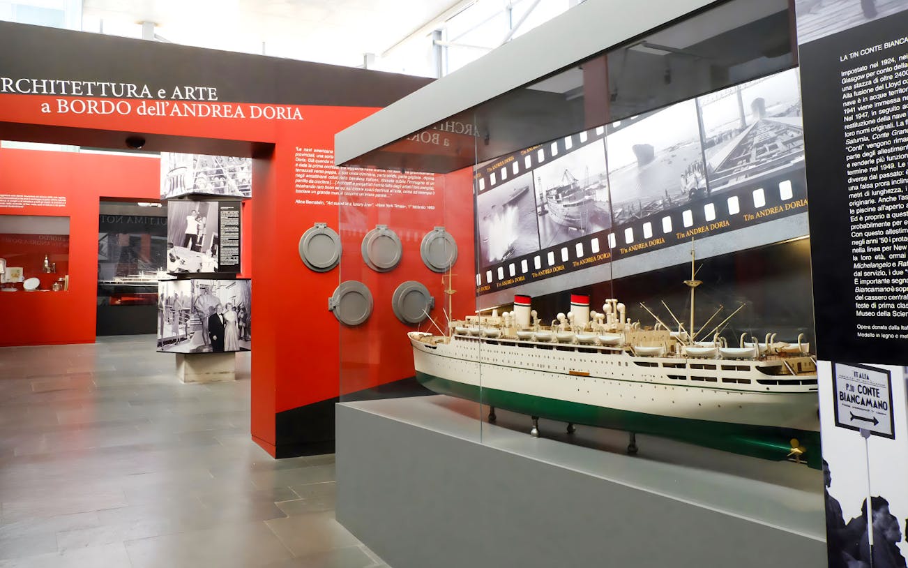 Model ship display at Galata Museo del Mare, Genoa, featuring Andrea Doria exhibit.