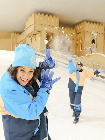 Visitors enjoying snow play at Snow Dunes Theme Park.