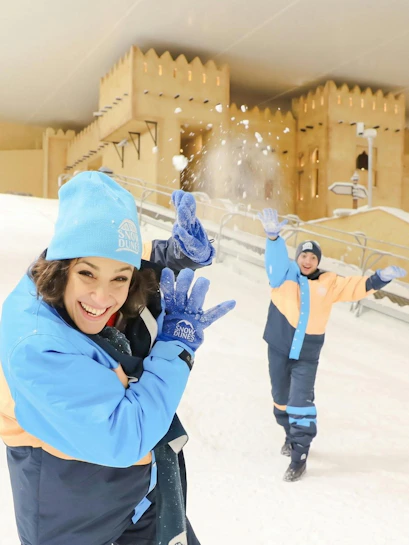 Visitors enjoying snow play at Snow Dunes Theme Park.