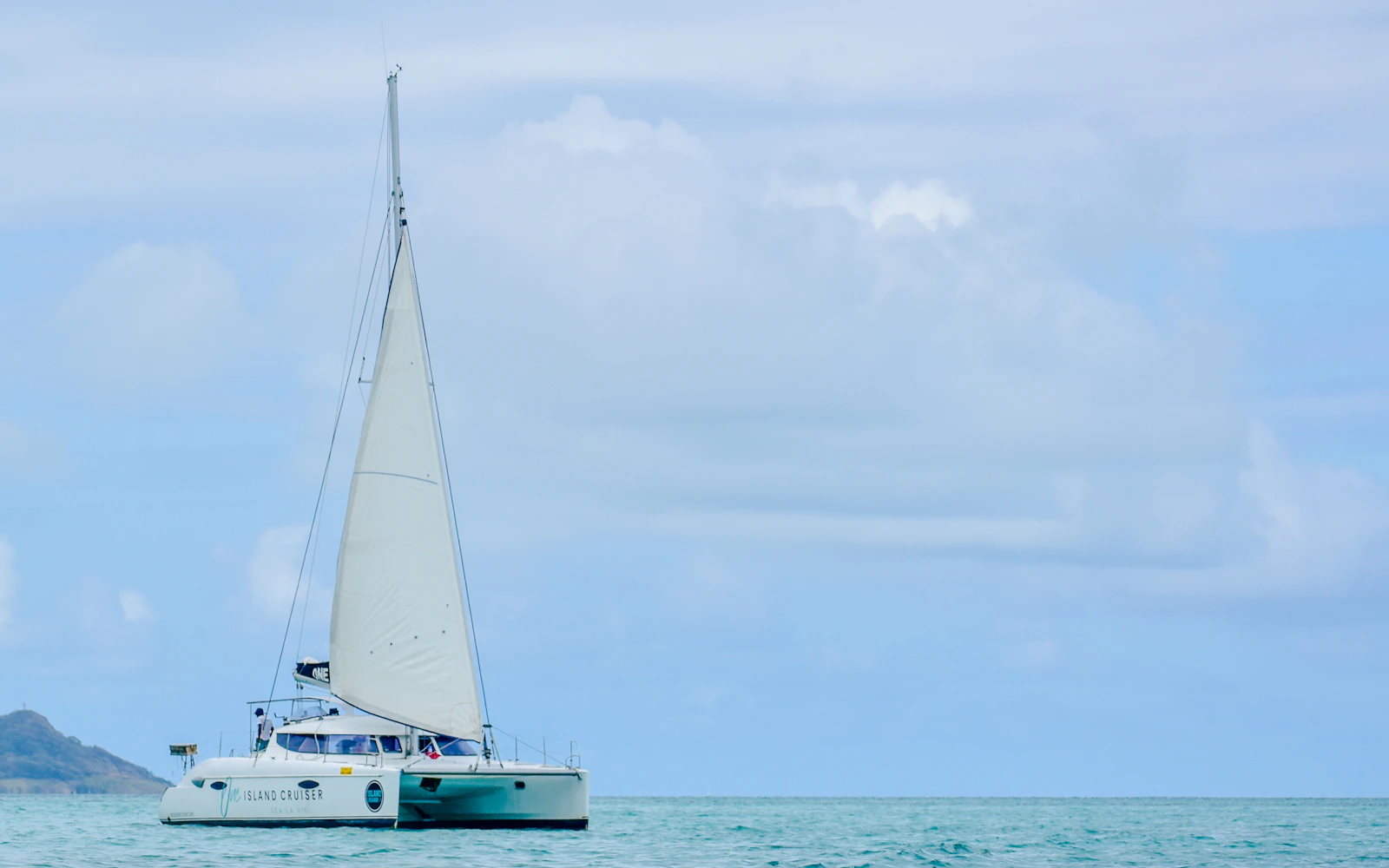 From Pointe Jerome: Île aux Cerfs Catamaran Cruise with Lunch and Hotel Transfers
