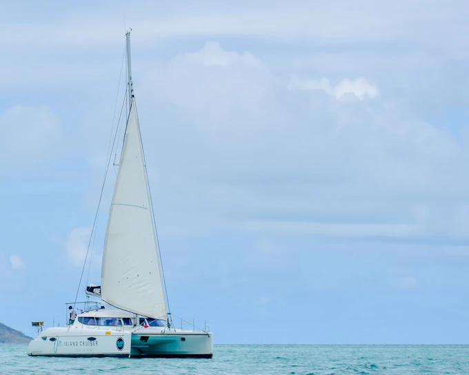 From Pointe Jerome: Île aux Cerfs Catamaran Cruise with Lunch and Hotel Transfers