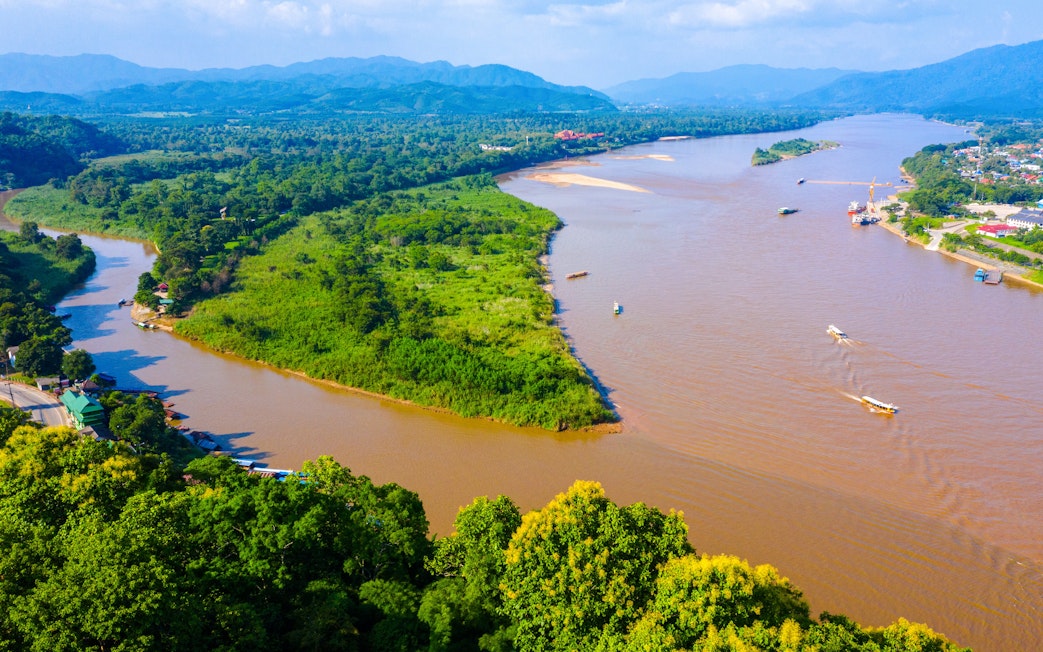 Aerial view of boats on the Mekong River at the Golden Triangle, Chiang Rai, Thailand.
