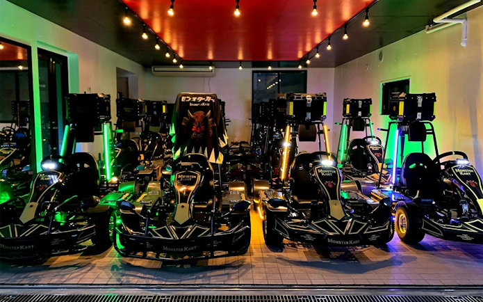 Electric go-karts lined up indoors for Asakusa 120 min tour.