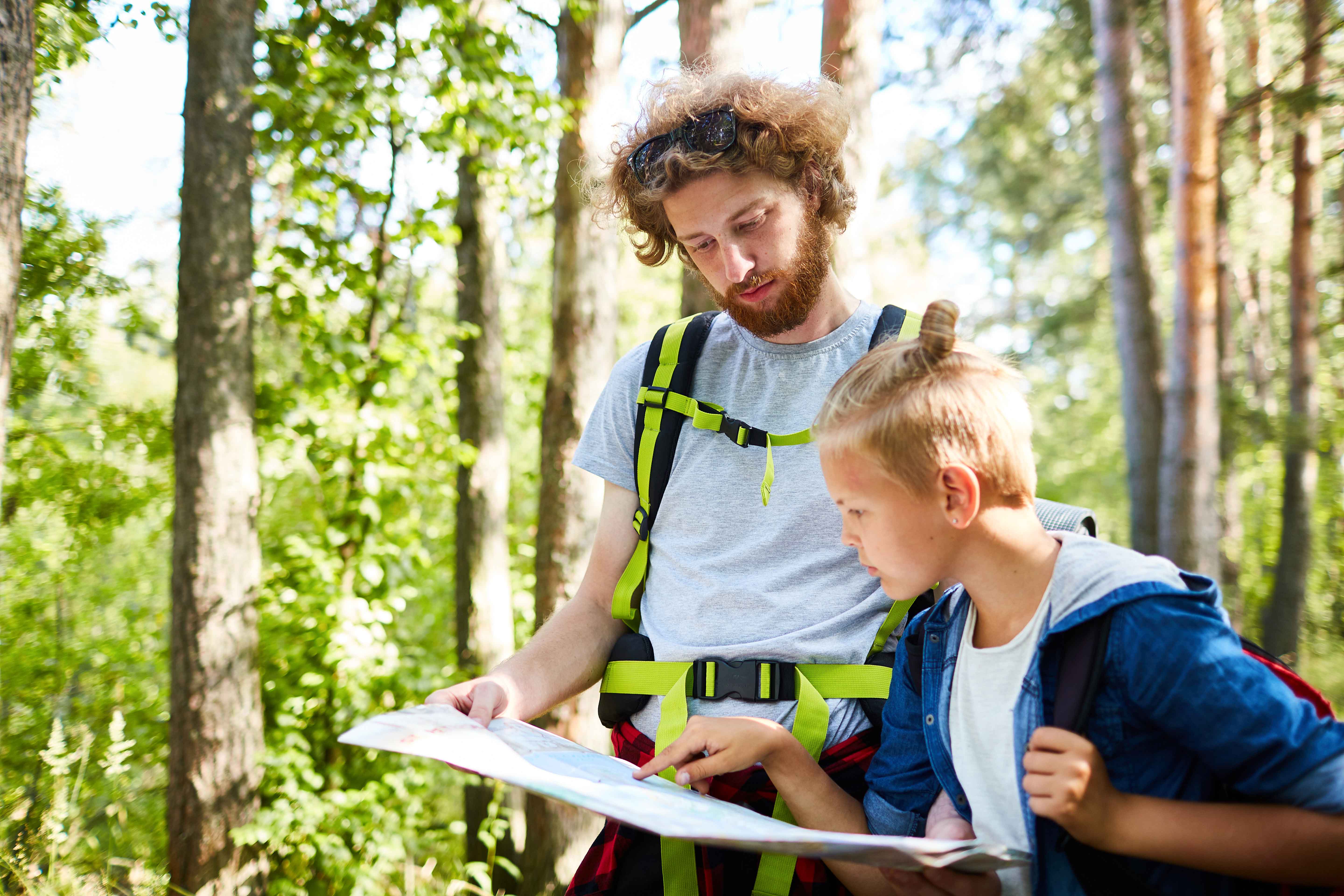 Father and Son looking at a Map - Grindelwald in August