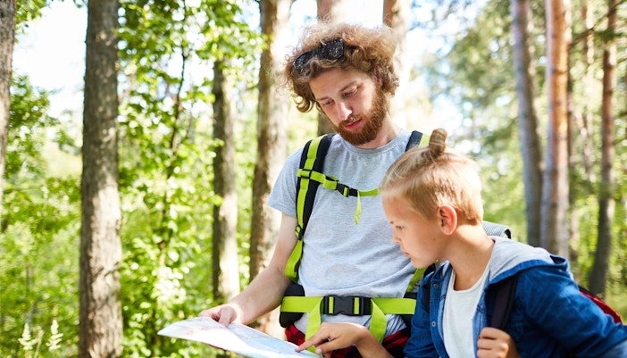 Father and Son looking at a Map - Grindelwald in August