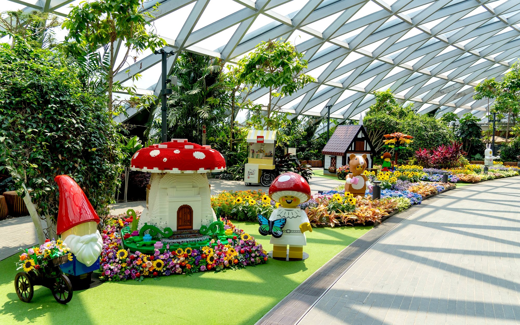Jewel Canopy Park with colorful LEGO sculptures and vibrant flower displays.