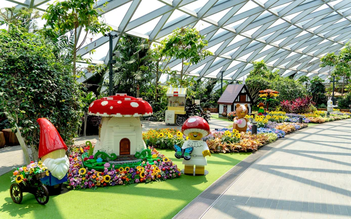 Jewel Canopy Park with colorful LEGO sculptures and vibrant flower displays.
