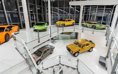 Historic and modern Lamborghini cars displayed at Museo Automobili Lamborghini, Italy.