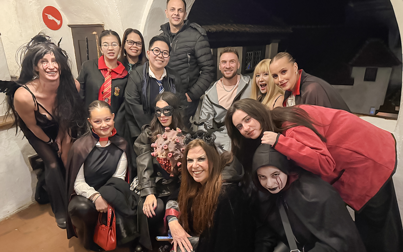 Guests in costumes at Bran Castle Halloween party.