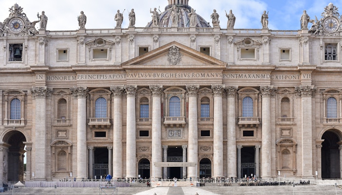 Vatican Grottoes interior with ancient tombs and religious artifacts.