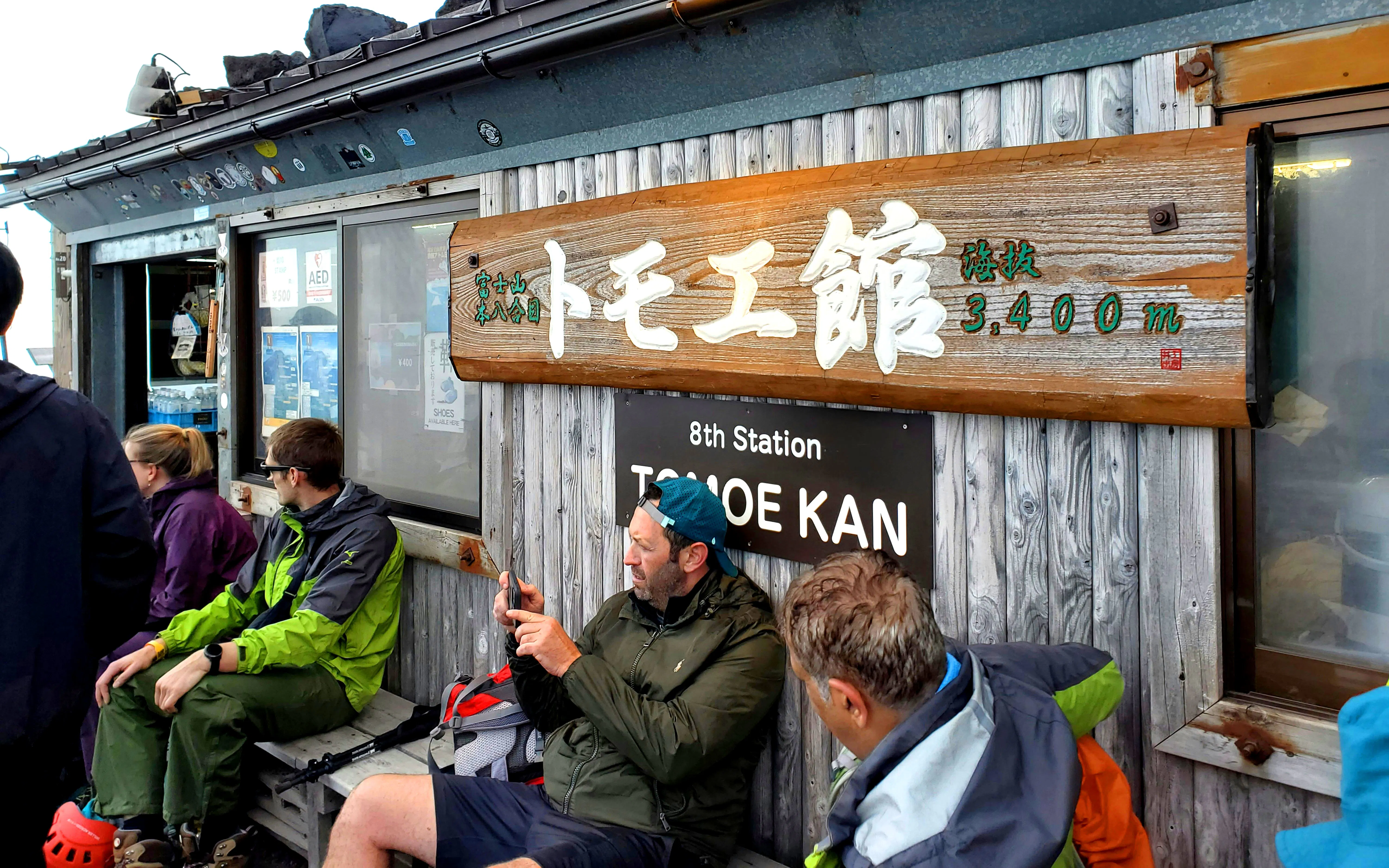 Climbers resting at Tomoe Kan, 8th Station, Mt. Fuji Climbing Tour.
