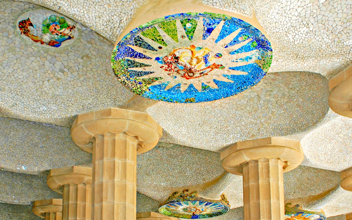 Mosaic ceiling and columns in Park Güell, Barcelona.