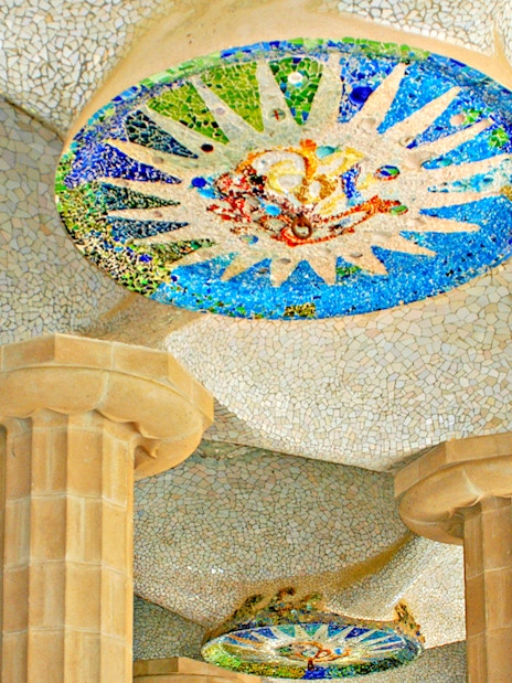 Mosaic ceiling and columns in Park Güell, Barcelona.