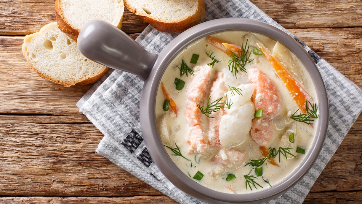 Seafood chowder served with bread on a lunch cruise from Gdansk to Westerplatte.