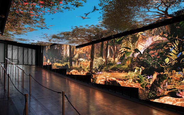 Immersive digital forest display at The Peak Tram Sky Pass, Hong Kong.