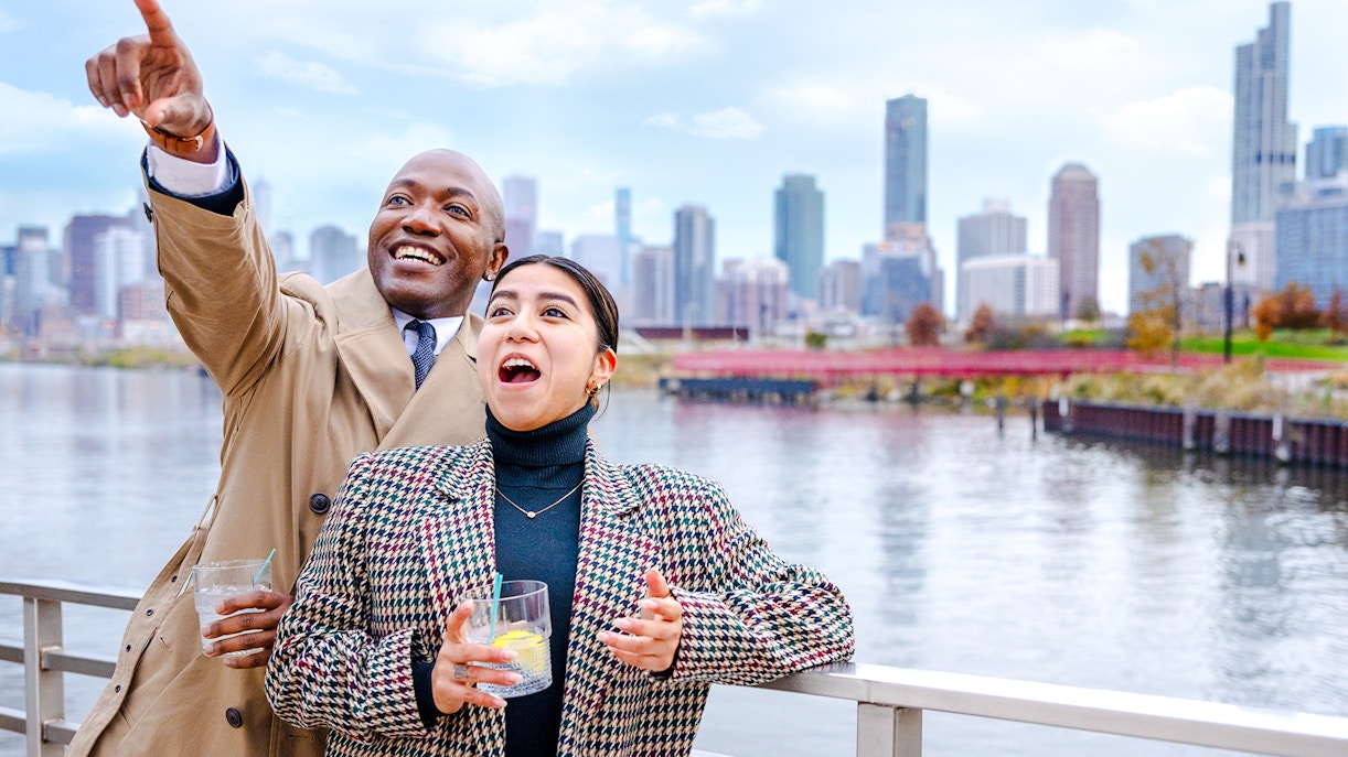 Guests enjoying views on Lake Michigan dinner cruise with Chicago skyline.