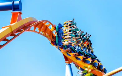 Talon roller coaster at Dorney Park, riders upside down on a loop.