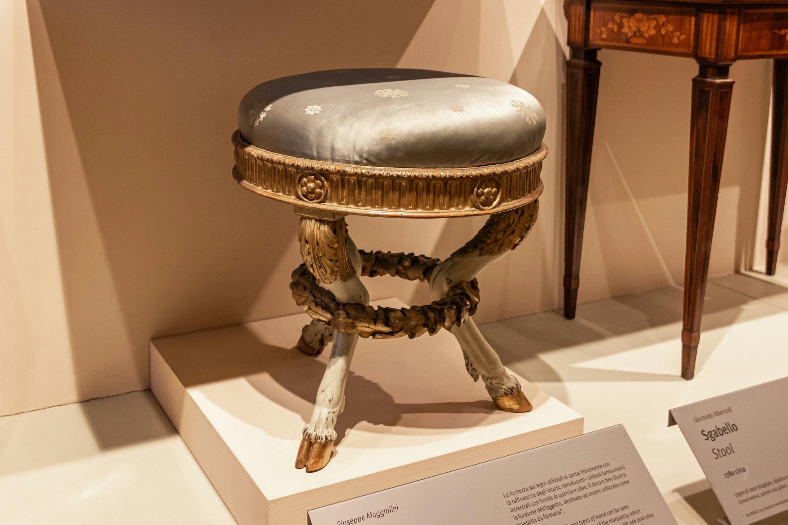 Sgabello stool with ornate carvings at Sforza Castle Furniture Museum, Milan.