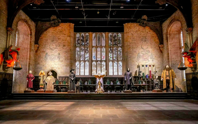 Costumes displayed in the Great Hall set at Warner Bros. Studio Tour Tokyo - The Making of Harry Potter.