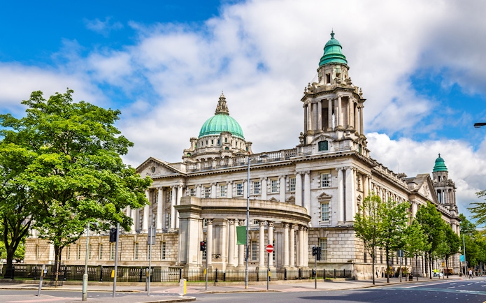 Belfast City Hall with green domes and classical architecture in Belfast, Northern Ireland.