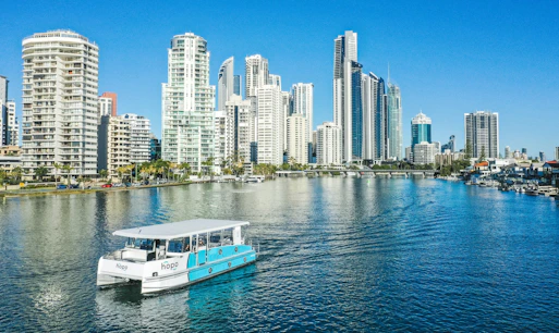 Hop On Hop Off Cruise boat docked at Gold Coast pier, Australia.