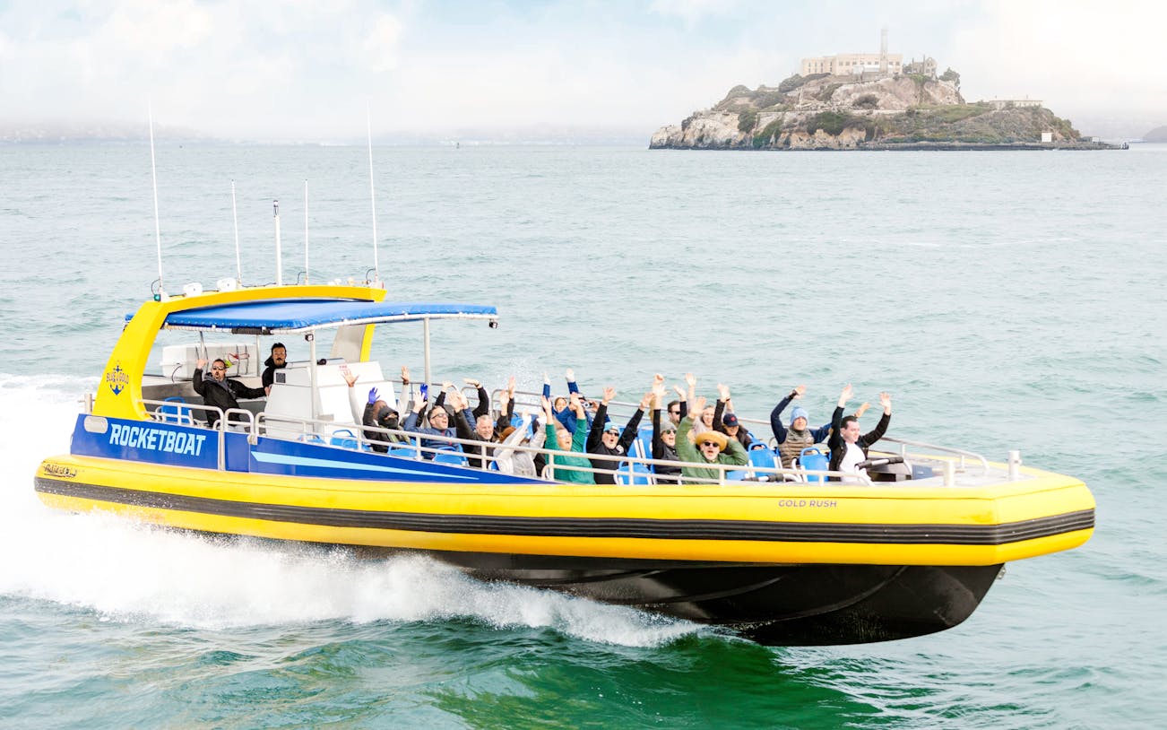 Rocketboat speedboat with passengers near Alcatraz Island, San Francisco.