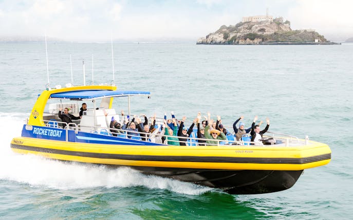 Rocketboat speedboat with passengers near Alcatraz Island, San Francisco.