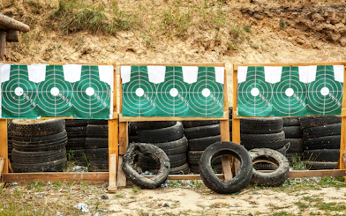 Shooting range targets with tires at an outdoor extreme shooting range.