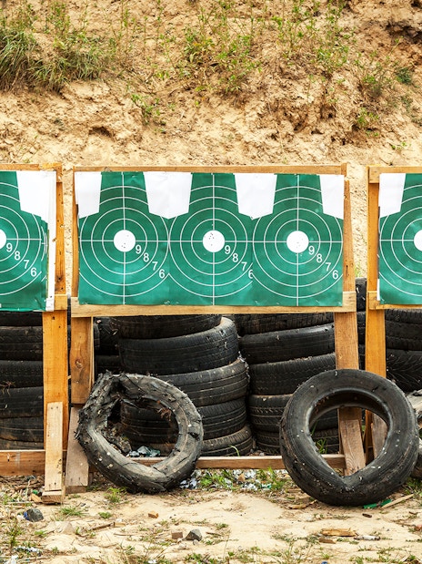 Shooting range targets with tires at an outdoor extreme shooting range.