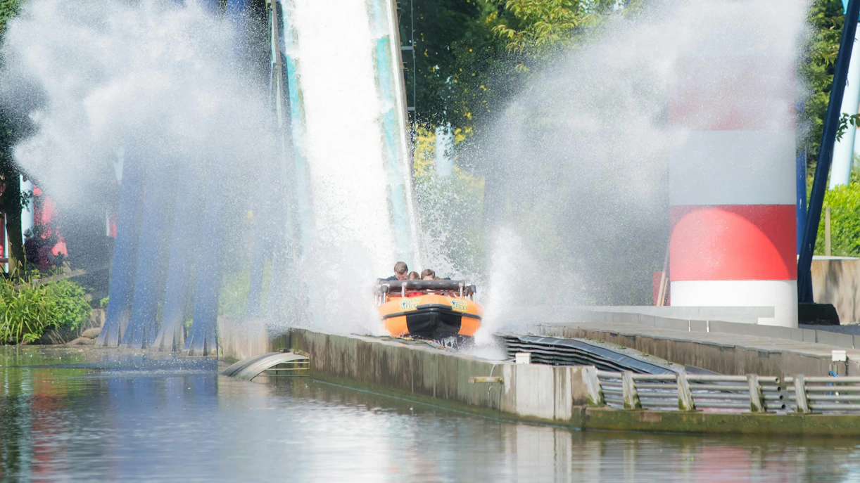 Log flume ride splashing down at Drayton Manor theme park.