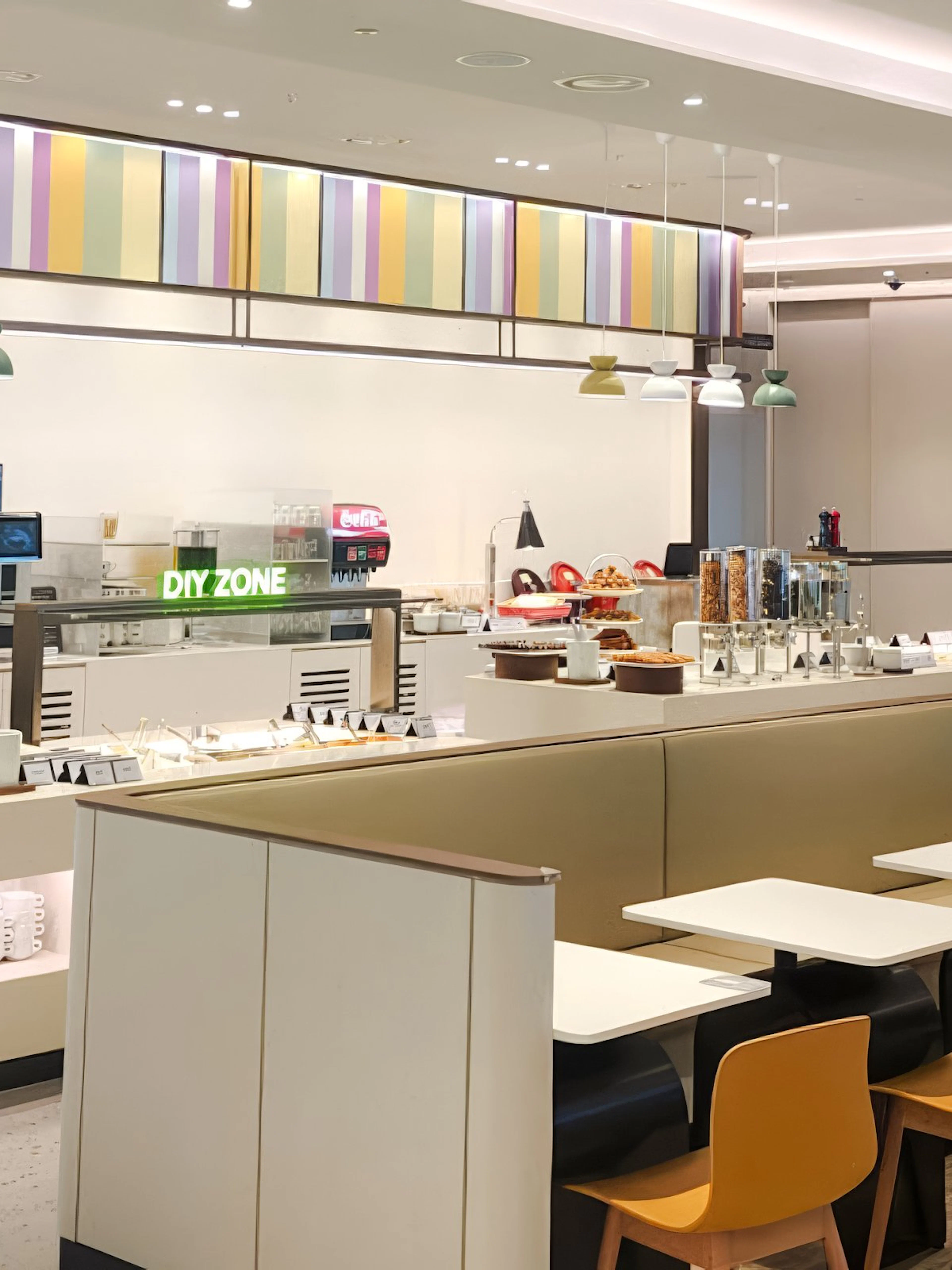 Restaurant seating and self-service area at Sky Hub Lounge, Seoul Incheon Airport East Concourse.