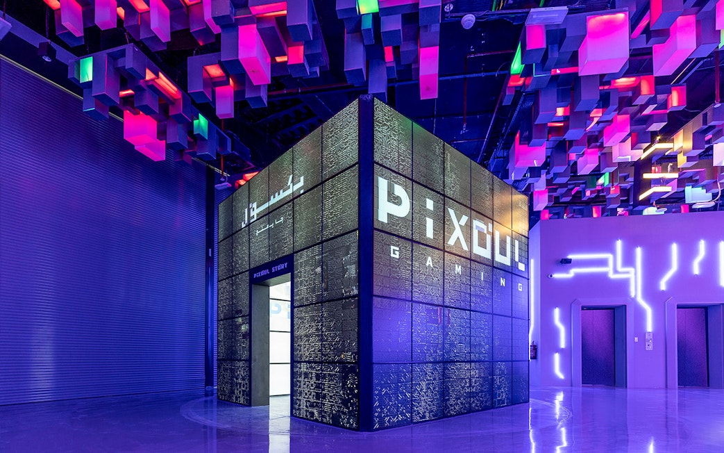 Pixoul Gaming area at Al Qana, Abu Dhabi with vibrant ceiling lights.