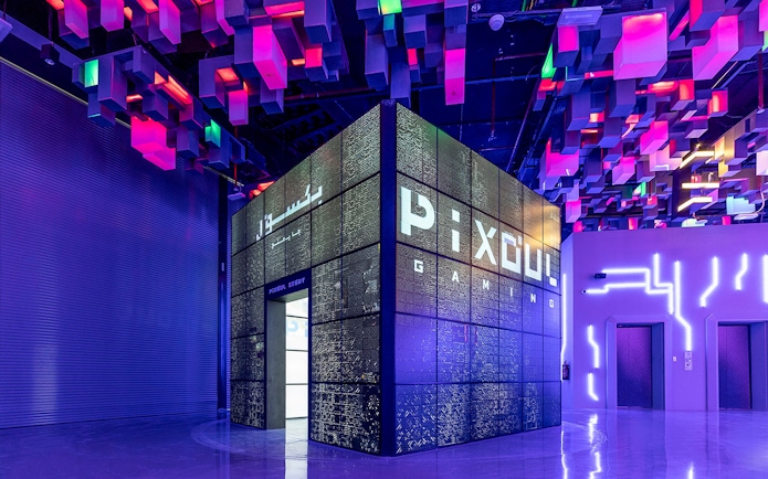 Pixoul Gaming area at Al Qana, Abu Dhabi with vibrant ceiling lights.