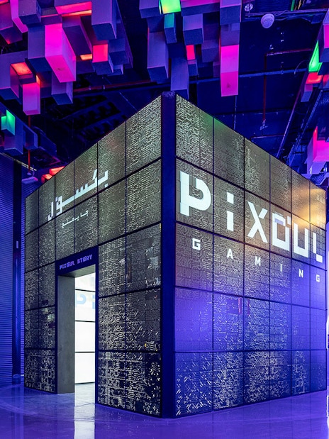 Pixoul Gaming area at Al Qana, Abu Dhabi with vibrant ceiling lights.