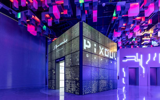 Pixoul Gaming area at Al Qana, Abu Dhabi with vibrant ceiling lights.