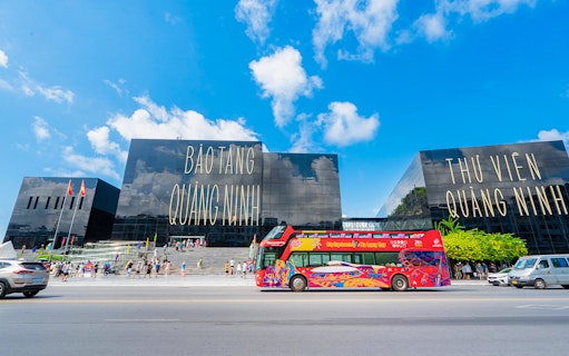 Hop-On Hop-Off bus in front of Quang Ninh Museum, Ha Long Bay.