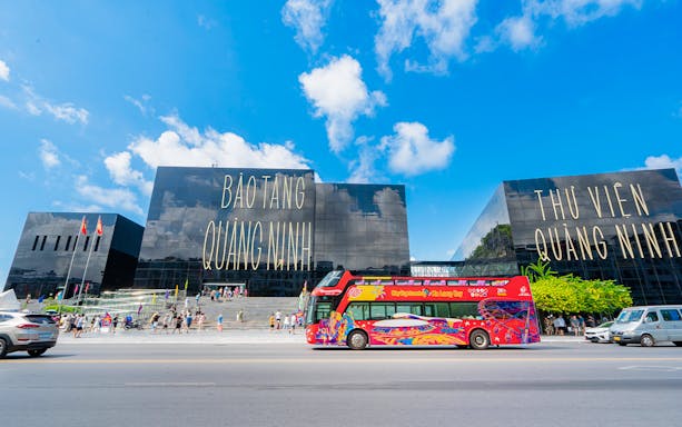 Hop-On Hop-Off bus in front of Quang Ninh Museum, Ha Long Bay.