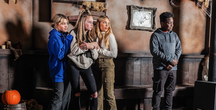 Guests reacting during London Dungeons Scare and Share experience.