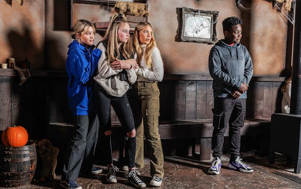 Guests reacting during London Dungeons Scare and Share experience.