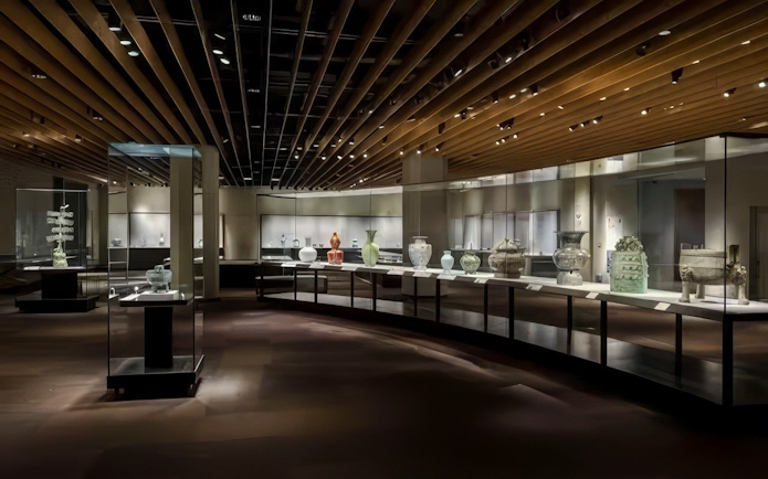 Artefacts displayed inside Tokyo National Museum exhibit hall.