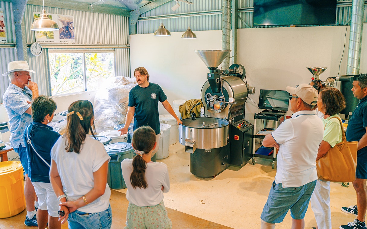 Tour group learning about coffee roasting at Tamborine Mountain.