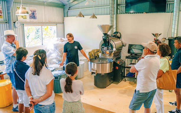 Tour group learning about coffee roasting at Tamborine Mountain.