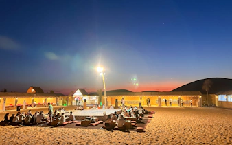 abu dhabi evening desert safari with 4x4 dune bashing, camel ride, bbq dinner and live shows-6