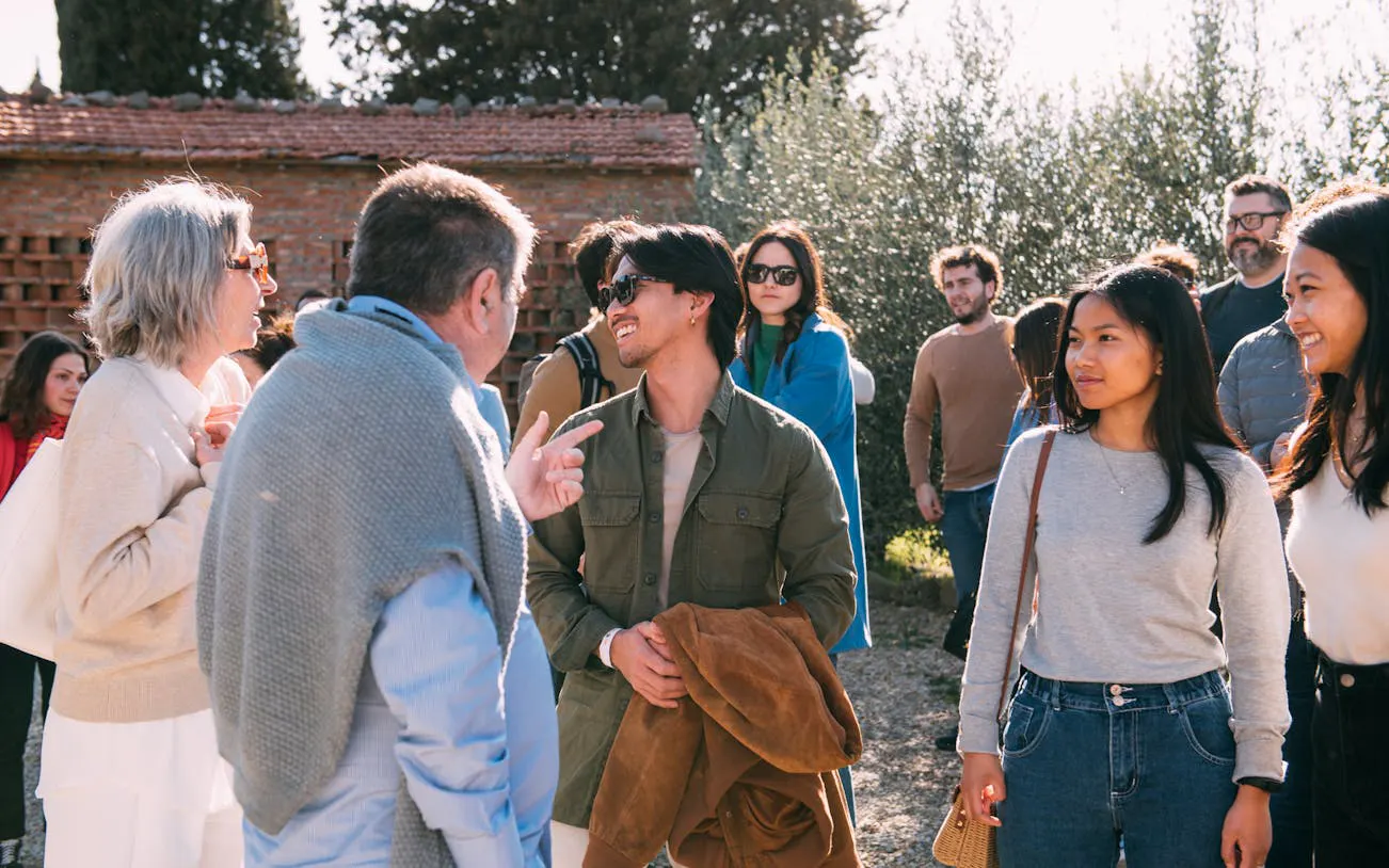 Group of tourists enjoying a conversation during Chianti Half Day Tour from Florence.
