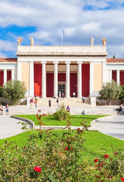 National Archaeological Museum entrance with columns and visitors in Athens, Greece.