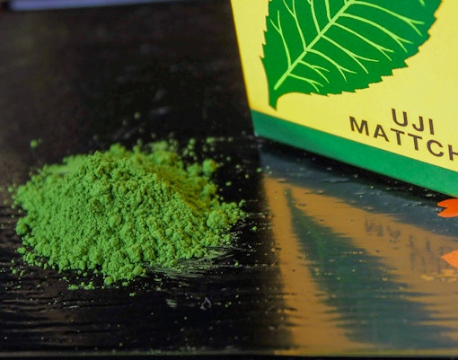 Uji matcha powder on a table, part of the Flower Teahouse tea ceremony in Kyoto.