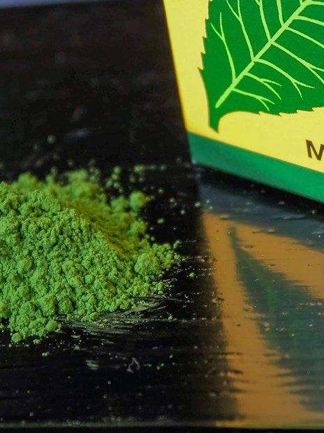 Uji matcha powder on a table, part of the Flower Teahouse tea ceremony in Kyoto.
