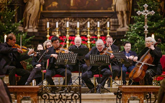 Musicians performing at a Christmas concert inside St. Stephen's Cathedral, Vienna.