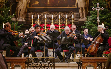 Musicians performing at a Christmas concert inside St. Stephen's Cathedral, Vienna.
