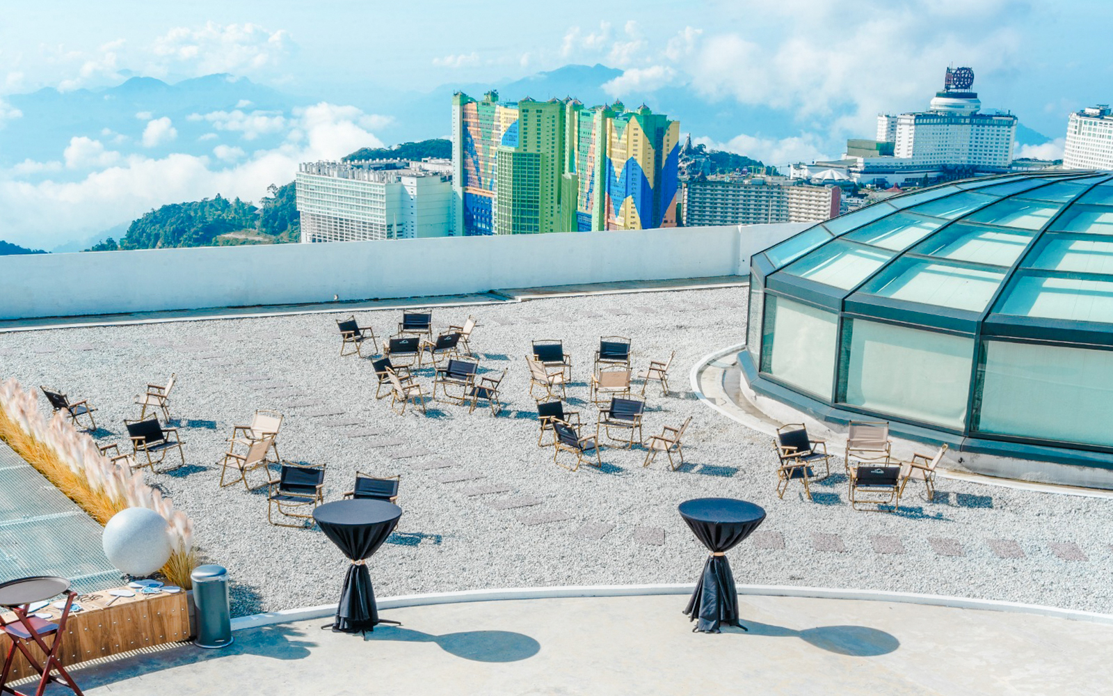 Wide angle view from Hoverland at Wyndham Ion Majestic Hotel, Genting Highlands showing outdoor seating and skyline.